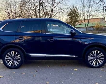 Синий Мицубиси Аутлендер, объемом двигателя 2.4 л и пробегом 71 тыс. км за 11800 $, фото 7 на Automoto.ua