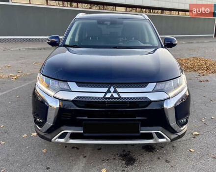 Синий Мицубиси Аутлендер, объемом двигателя 2.36 л и пробегом 71 тыс. км за 13800 $, фото 1 на Automoto.ua