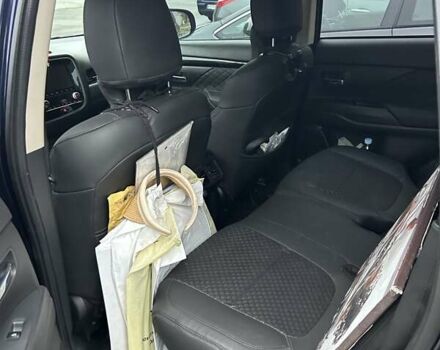 Синий Мицубиси Аутлендер, объемом двигателя 2.36 л и пробегом 129 тыс. км за 16500 $, фото 4 на Automoto.ua