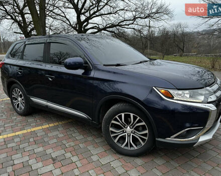 Синій Міцубісі Аутлендер, об'ємом двигуна 2.36 л та пробігом 144 тис. км за 16700 $, фото 4 на Automoto.ua