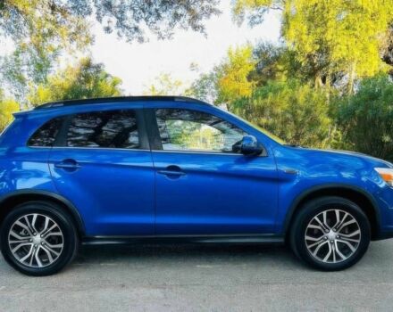 Синий Мицубиси Аутлендер, объемом двигателя 2.4 л и пробегом 45 тыс. км за 10700 $, фото 6 на Automoto.ua