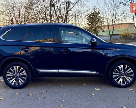 Синий Мицубиси Аутлендер, объемом двигателя 2.36 л и пробегом 71 тыс. км за 13800 $, фото 8 на Automoto.ua