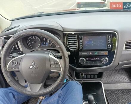 Синий Мицубиси Аутлендер, объемом двигателя 2.4 л и пробегом 134 тыс. км за 15200 $, фото 12 на Automoto.ua