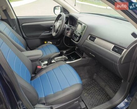 Синий Мицубиси Аутлендер, объемом двигателя 2.4 л и пробегом 134 тыс. км за 15200 $, фото 5 на Automoto.ua