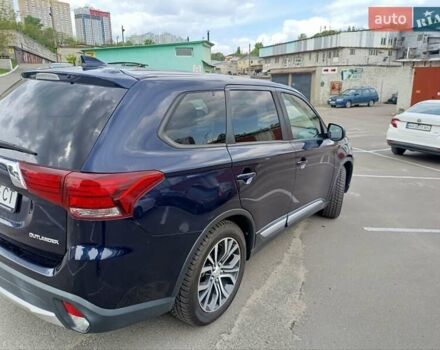 Синий Мицубиси Аутлендер, объемом двигателя 2.4 л и пробегом 134 тыс. км за 15200 $, фото 4 на Automoto.ua