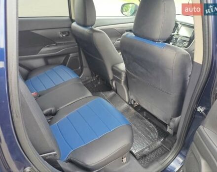 Синий Мицубиси Аутлендер, объемом двигателя 2.4 л и пробегом 134 тыс. км за 15200 $, фото 6 на Automoto.ua