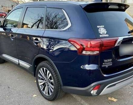 Синий Мицубиси Аутлендер, объемом двигателя 2.4 л и пробегом 71 тыс. км за 11800 $, фото 4 на Automoto.ua