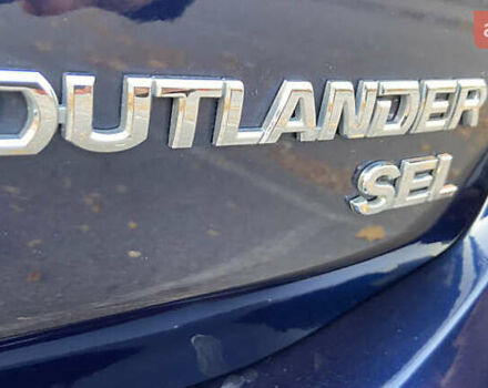 Синий Мицубиси Аутлендер, объемом двигателя 2.36 л и пробегом 71 тыс. км за 13800 $, фото 11 на Automoto.ua