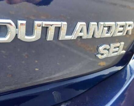 Синий Мицубиси Аутлендер, объемом двигателя 2.4 л и пробегом 71 тыс. км за 11800 $, фото 9 на Automoto.ua