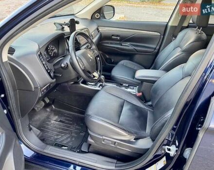 Синий Мицубиси Аутлендер, объемом двигателя 2.4 л и пробегом 71 тыс. км за 11800 $, фото 12 на Automoto.ua