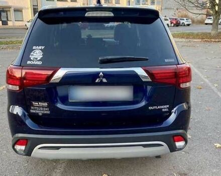 Синий Мицубиси Аутлендер, объемом двигателя 2.4 л и пробегом 71 тыс. км за 11800 $, фото 5 на Automoto.ua