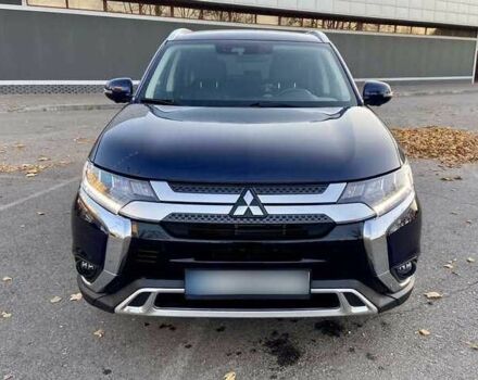Синий Мицубиси Аутлендер, объемом двигателя 2.4 л и пробегом 71 тыс. км за 11800 $, фото 1 на Automoto.ua
