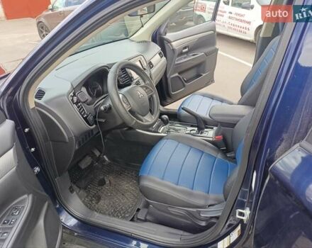 Синий Мицубиси Аутлендер, объемом двигателя 2.4 л и пробегом 134 тыс. км за 15200 $, фото 8 на Automoto.ua