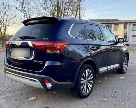 Синий Мицубиси Аутлендер, объемом двигателя 2.4 л и пробегом 71 тыс. км за 11800 $, фото 6 на Automoto.ua