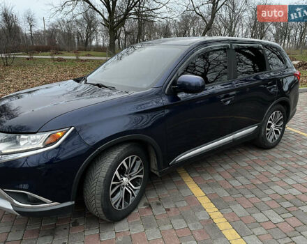 Синій Міцубісі Аутлендер, об'ємом двигуна 2.36 л та пробігом 144 тис. км за 16700 $, фото 2 на Automoto.ua