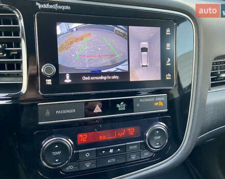 Синий Мицубиси Аутлендер, объемом двигателя 2.36 л и пробегом 71 тыс. км за 13800 $, фото 16 на Automoto.ua