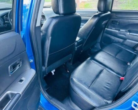 Синий Мицубиси Аутлендер, объемом двигателя 2.4 л и пробегом 45 тыс. км за 10700 $, фото 10 на Automoto.ua