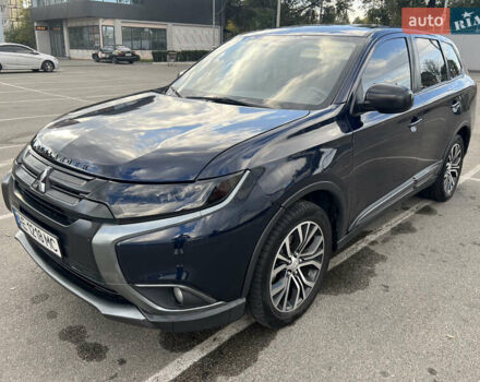 Синий Мицубиси Аутлендер, объемом двигателя 2.36 л и пробегом 150 тыс. км за 15500 $, фото 1 на Automoto.ua
