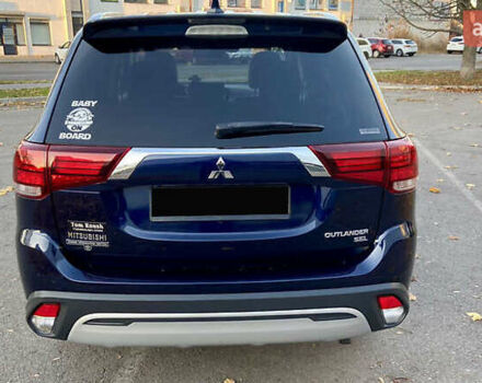 Синий Мицубиси Аутлендер, объемом двигателя 2.36 л и пробегом 71 тыс. км за 13800 $, фото 6 на Automoto.ua