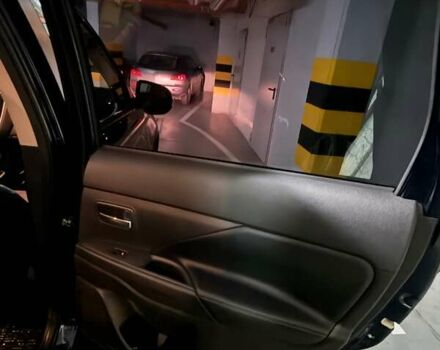 Синій Міцубісі Аутлендер, об'ємом двигуна 2 л та пробігом 128 тис. км за 20000 $, фото 13 на Automoto.ua