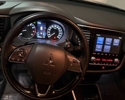 Синий Мицубиси Аутлендер, объемом двигателя 2 л и пробегом 128 тыс. км за 20000 $, фото 9 на Automoto.ua