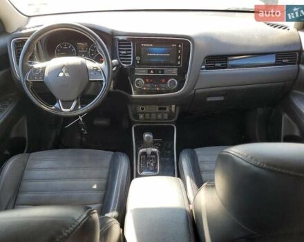 Синий Мицубиси Аутлендер, объемом двигателя 2.36 л и пробегом 187 тыс. км за 2900 $, фото 7 на Automoto.ua