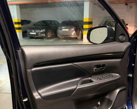 Синий Мицубиси Аутлендер, объемом двигателя 2 л и пробегом 128 тыс. км за 20000 $, фото 10 на Automoto.ua