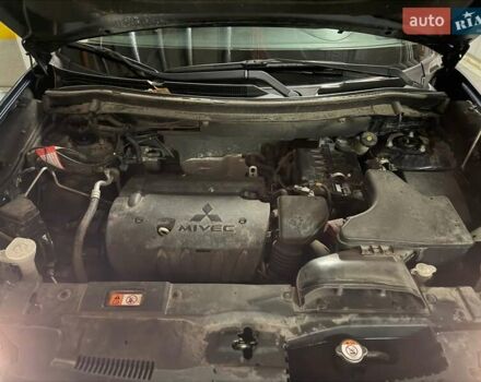 Синій Міцубісі Аутлендер, об'ємом двигуна 2 л та пробігом 128 тис. км за 20000 $, фото 11 на Automoto.ua