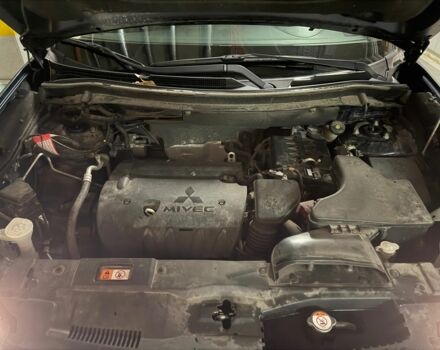 Синий Мицубиси Аутлендер, объемом двигателя 2 л и пробегом 128 тыс. км за 20000 $, фото 12 на Automoto.ua