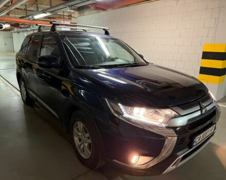 Синий Мицубиси Аутлендер, объемом двигателя 2 л и пробегом 128 тыс. км за 20000 $, фото 3 на Automoto.ua