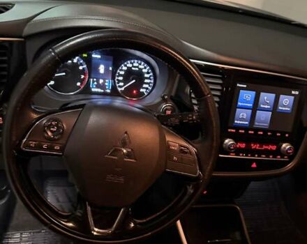 Синій Міцубісі Аутлендер, об'ємом двигуна 2 л та пробігом 128 тис. км за 20000 $, фото 8 на Automoto.ua