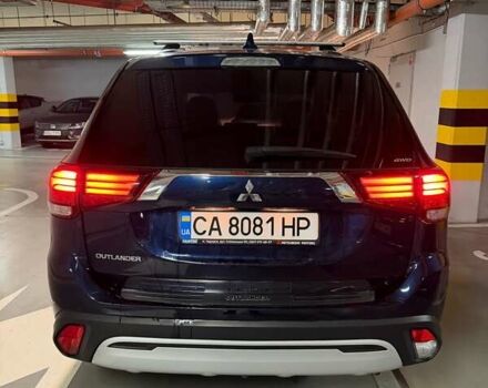 Синій Міцубісі Аутлендер, об'ємом двигуна 2 л та пробігом 128 тис. км за 20000 $, фото 4 на Automoto.ua