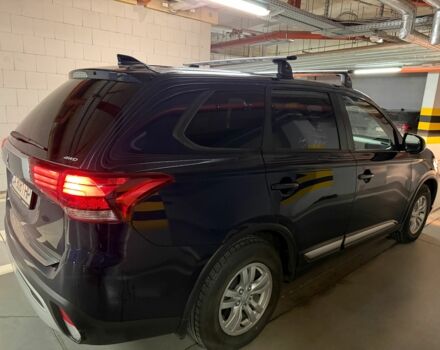 Синий Мицубиси Аутлендер, объемом двигателя 2 л и пробегом 128 тыс. км за 20000 $, фото 4 на Automoto.ua