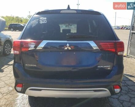 Синий Мицубиси Аутлендер, объемом двигателя 2.36 л и пробегом 187 тыс. км за 2900 $, фото 5 на Automoto.ua