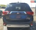 Синий Мицубиси Аутлендер, объемом двигателя 2.36 л и пробегом 187 тыс. км за 2900 $, фото 5 на Automoto.ua