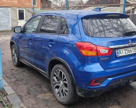 Синий Мицубиси Аутлендер, объемом двигателя 2 л и пробегом 87 тыс. км за 15800 $, фото 2 на Automoto.ua