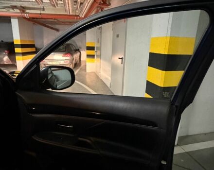 Синий Мицубиси Аутлендер, объемом двигателя 2 л и пробегом 128 тыс. км за 20000 $, фото 13 на Automoto.ua