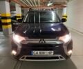 Синий Мицубиси Аутлендер, объемом двигателя 2 л и пробегом 128 тыс. км за 20000 $, фото 1 на Automoto.ua