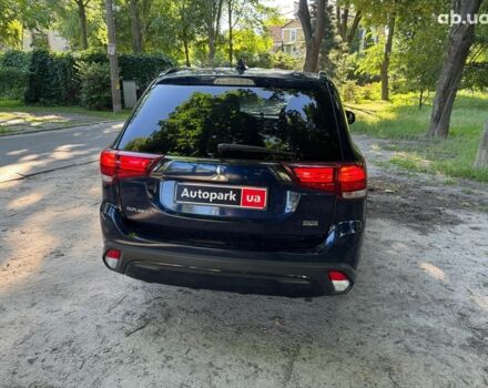 Синий Мицубиси Аутлендер, объемом двигателя 2.4 л и пробегом 75 тыс. км за 15990 $, фото 5 на Automoto.ua