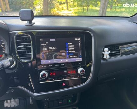 Синий Мицубиси Аутлендер, объемом двигателя 2.4 л и пробегом 75 тыс. км за 15990 $, фото 12 на Automoto.ua