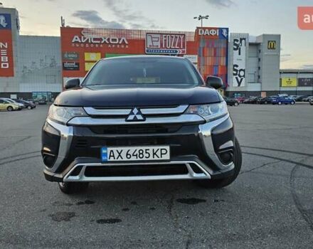 Синий Мицубиси Аутлендер, объемом двигателя 2.4 л и пробегом 106 тыс. км за 16500 $, фото 8 на Automoto.ua