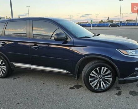 Синий Мицубиси Аутлендер, объемом двигателя 2.4 л и пробегом 106 тыс. км за 16500 $, фото 7 на Automoto.ua