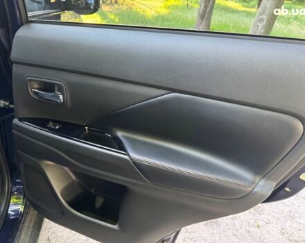 Синий Мицубиси Аутлендер, объемом двигателя 2.4 л и пробегом 75 тыс. км за 15990 $, фото 18 на Automoto.ua