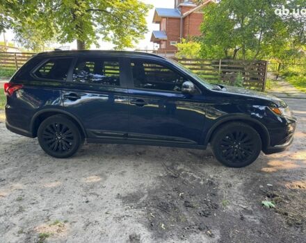 Синий Мицубиси Аутлендер, объемом двигателя 2.4 л и пробегом 75 тыс. км за 15990 $, фото 3 на Automoto.ua