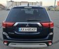 Синий Мицубиси Аутлендер, объемом двигателя 2.4 л и пробегом 106 тыс. км за 17000 $, фото 1 на Automoto.ua