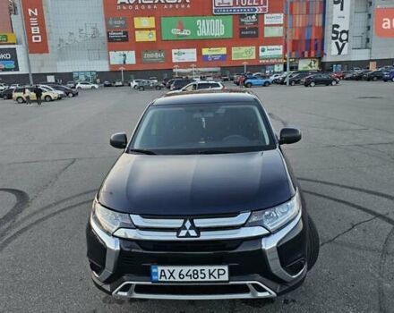 Синий Мицубиси Аутлендер, объемом двигателя 2.4 л и пробегом 106 тыс. км за 16500 $, фото 2 на Automoto.ua