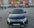 Синий Мицубиси Аутлендер, объемом двигателя 2.4 л и пробегом 106 тыс. км за 16500 $, фото 2 на Automoto.ua