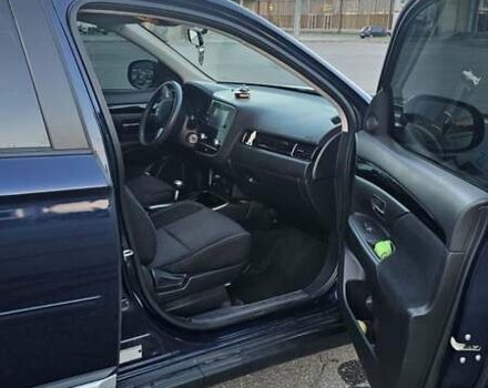 Синий Мицубиси Аутлендер, объемом двигателя 2.4 л и пробегом 106 тыс. км за 16500 $, фото 13 на Automoto.ua