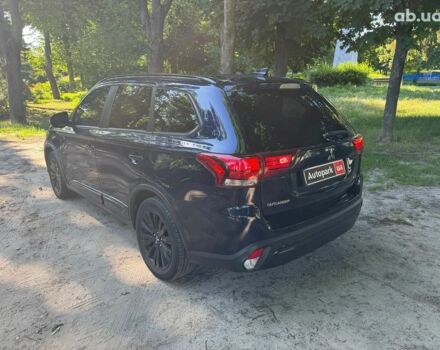 Синий Мицубиси Аутлендер, объемом двигателя 2.4 л и пробегом 75 тыс. км за 15990 $, фото 6 на Automoto.ua