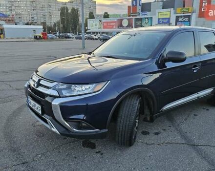 Синий Мицубиси Аутлендер, объемом двигателя 2.4 л и пробегом 106 тыс. км за 16500 $, фото 5 на Automoto.ua